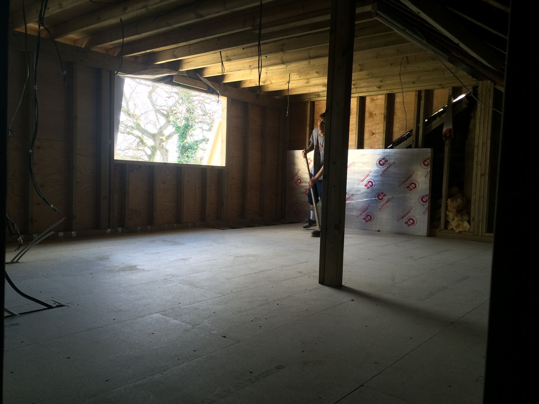 Loft room being boarded and plasterboarded